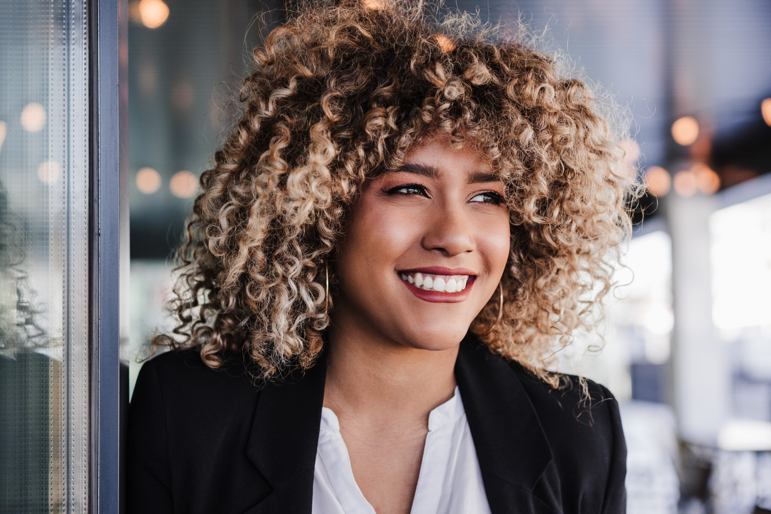 portrait of happy confident business woman in cafe       utc scaled