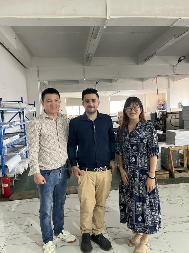 Founder with the Chinese supplier team inside a factory